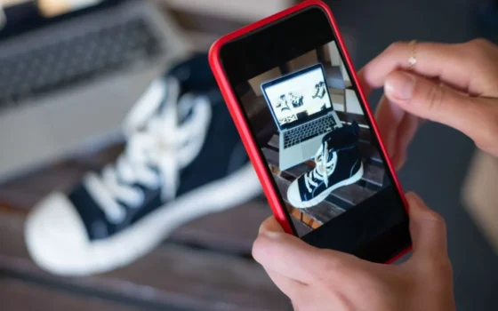 Capturing sneakers with a mobile phone for an online store showcase. E-commerce at its best.